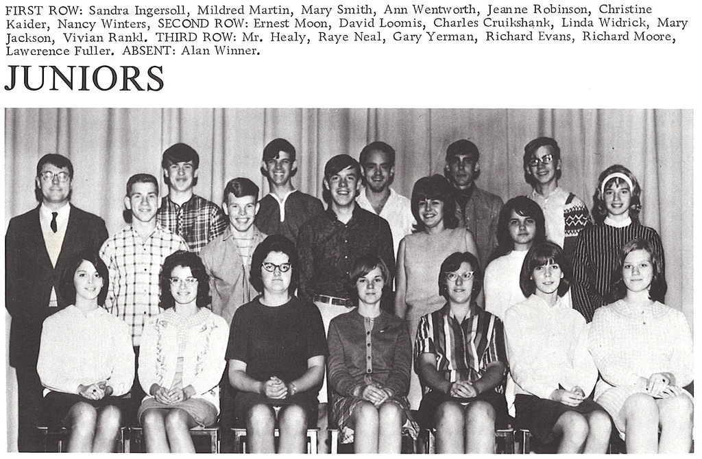 3 rows of high school students and their teacher in 1967 pose for a school picture, smiling