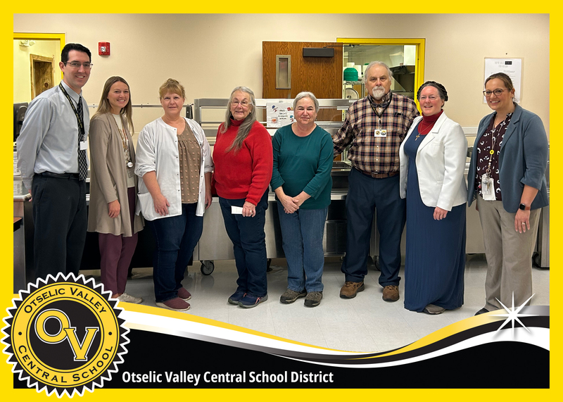Community partners and school representatives come together in support of the Holiday Basket effort, helping provide food assistance to Otselic Valley families in need.