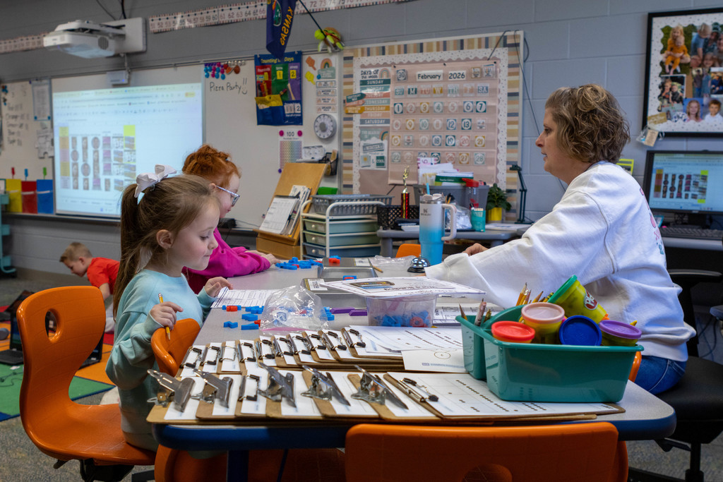 Child spelling with magnets