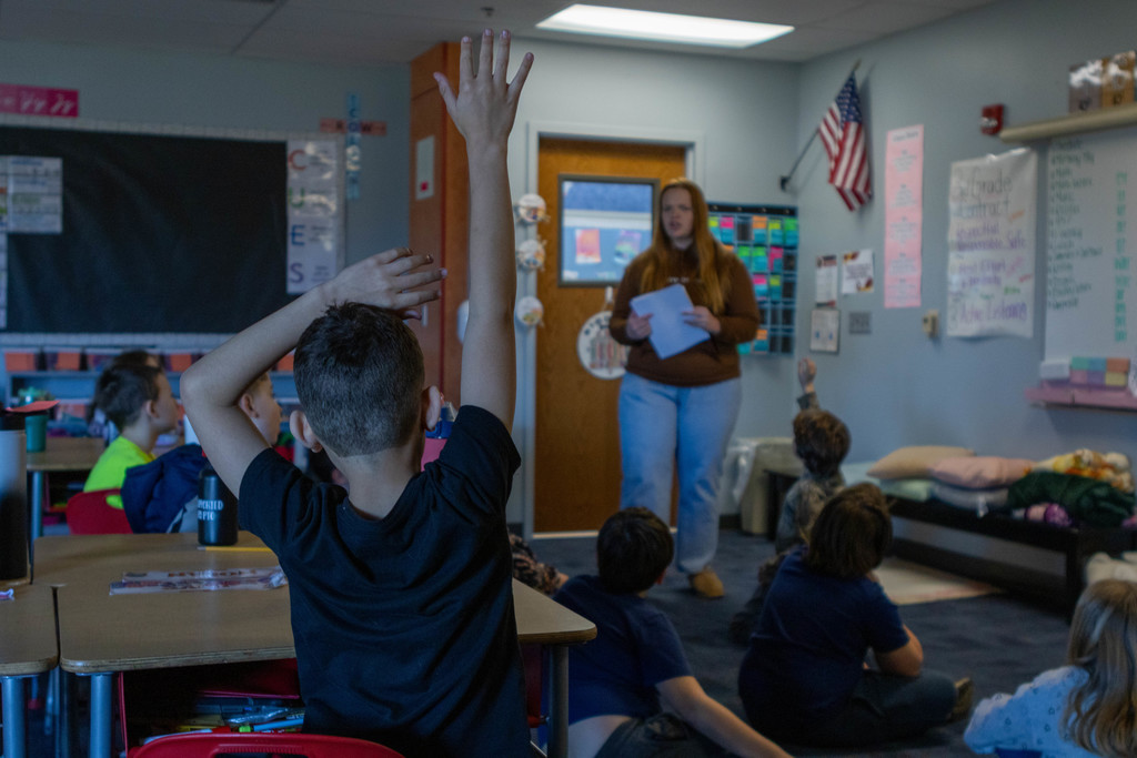 Children raising hand