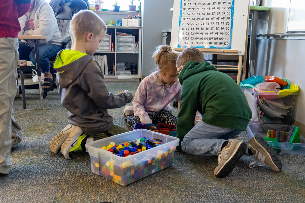 Kids building and playing together.