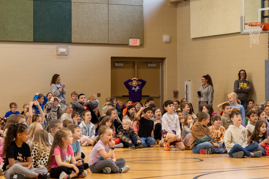 Kids at an assembly.
