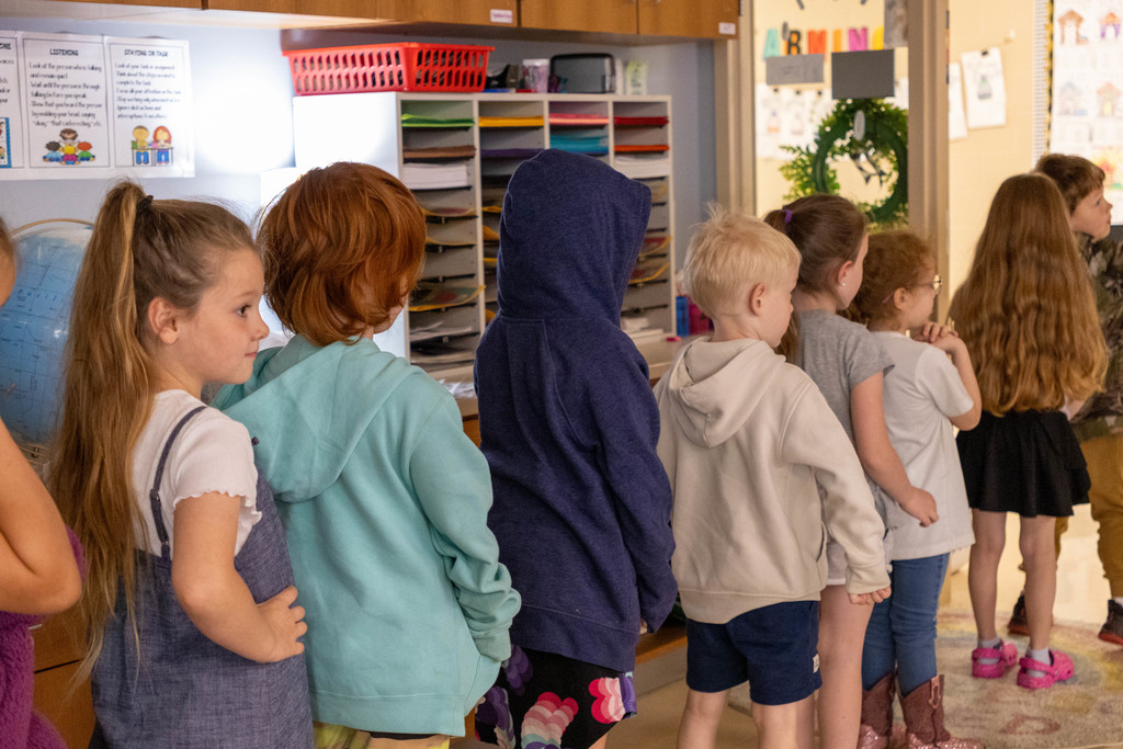 Kids lining up for recess.