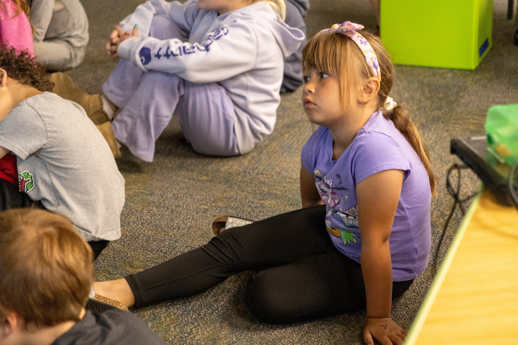 Kid listening.
