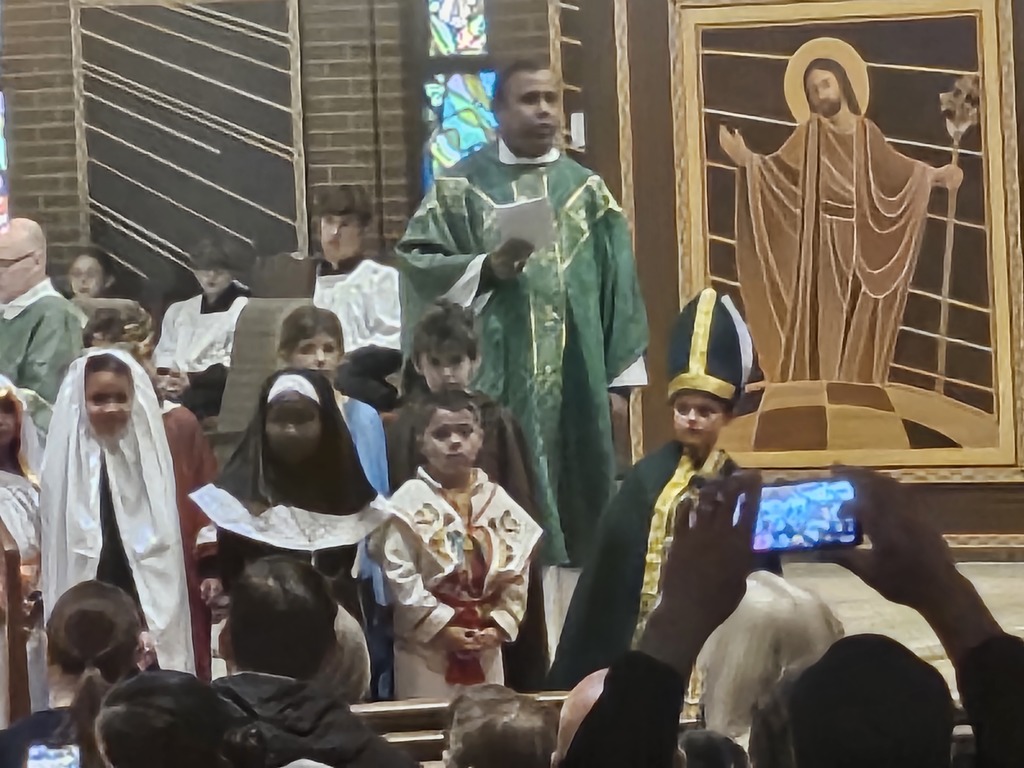 Father with first grade saints