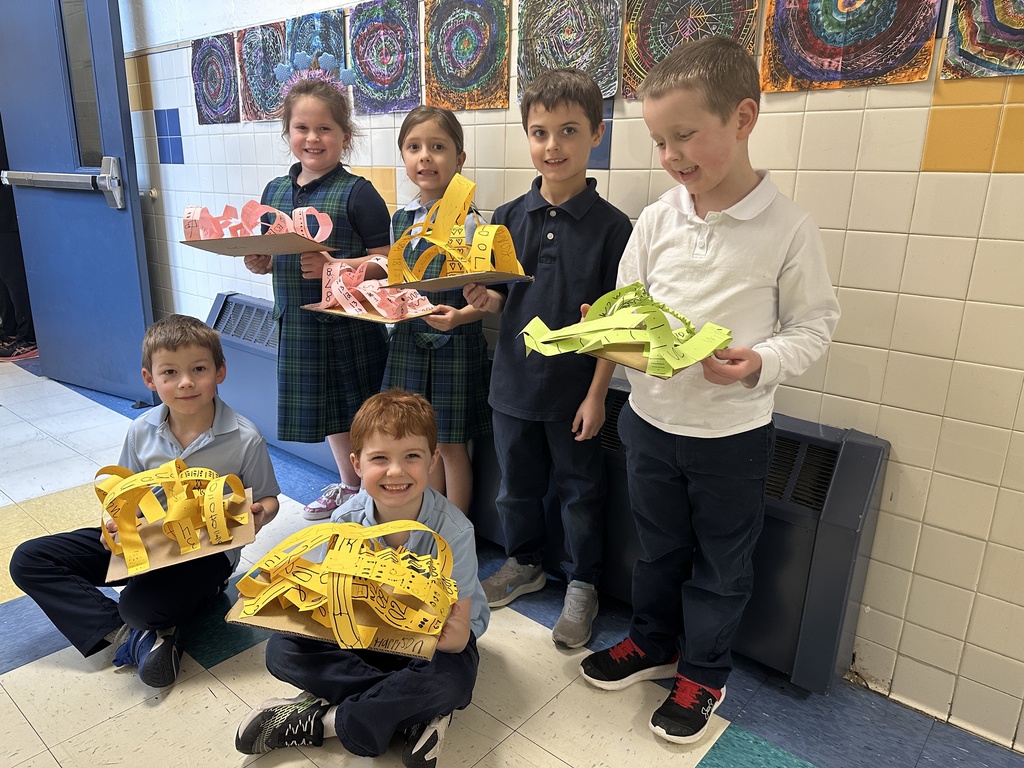 First graders with art work