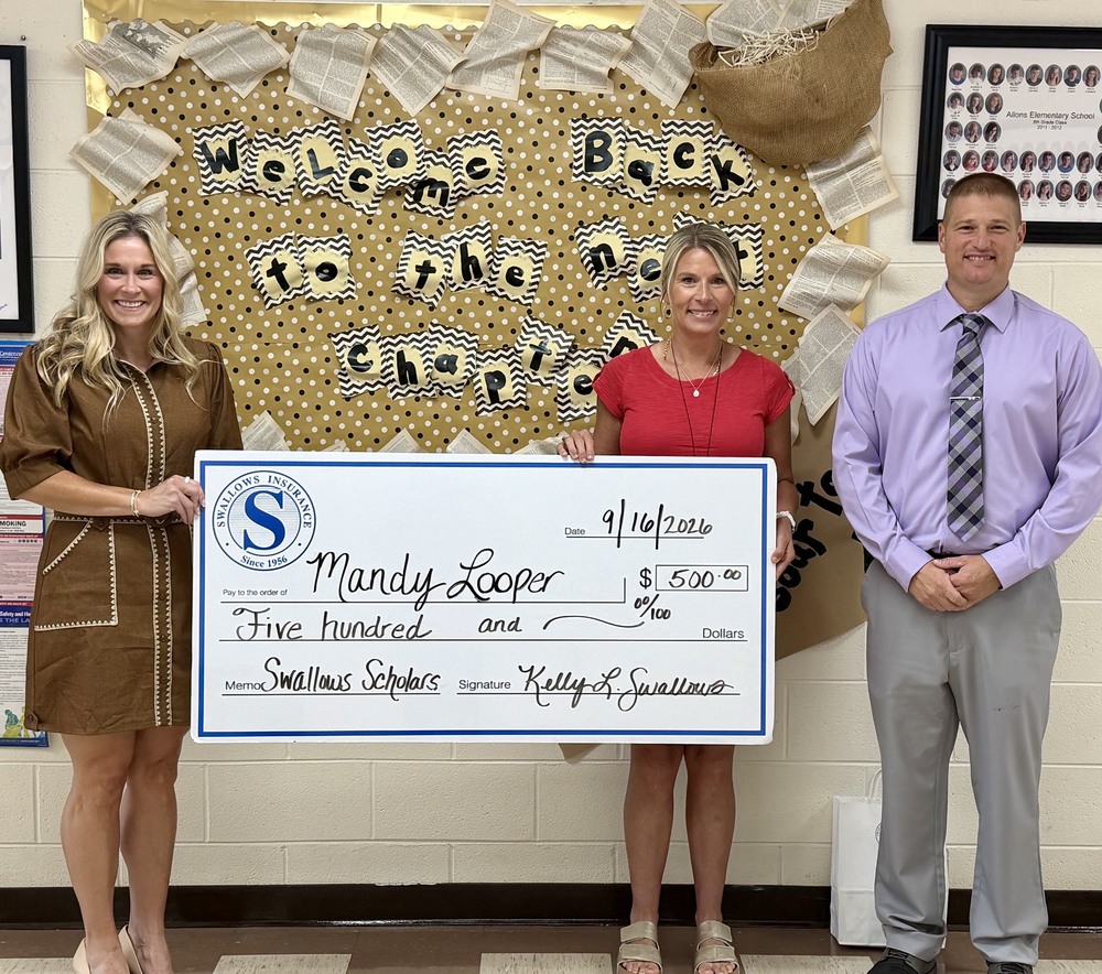 Swallows Insurance awards Mrs. Mandy Looper a $500 grant to use for our Hawk Bill Store