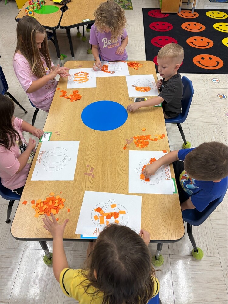 Pre-K practicing their cutting skills