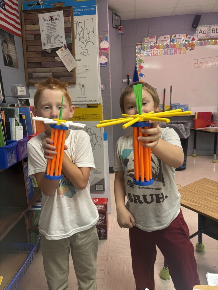 students designing replicas of the twin towers