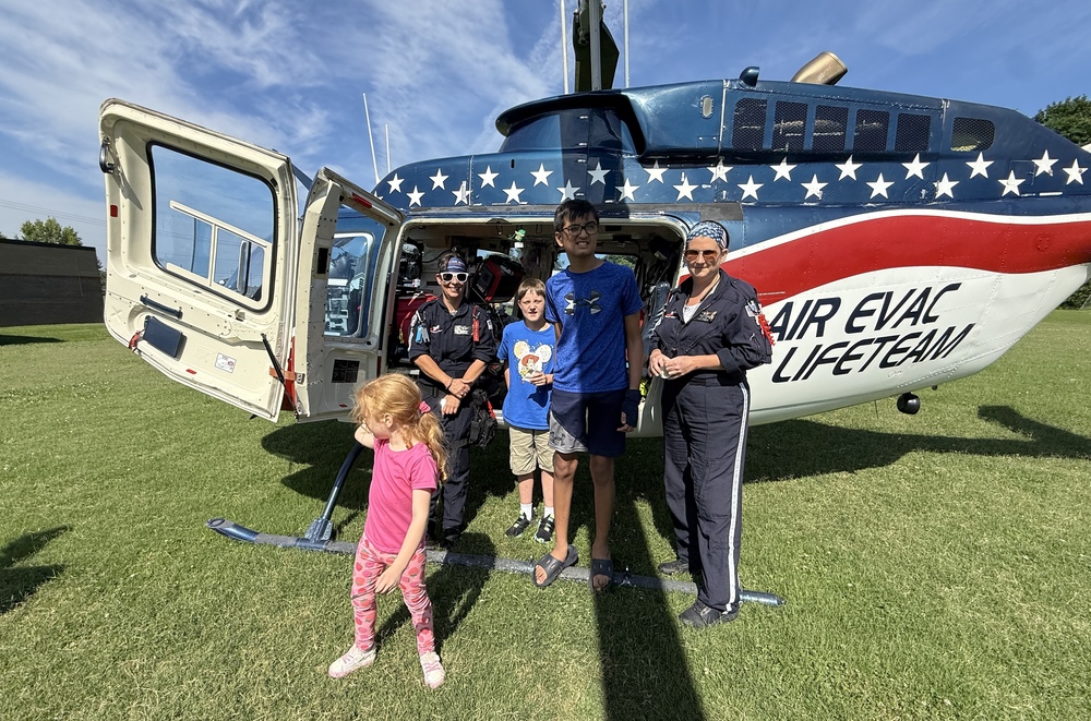 student viewing helicopter