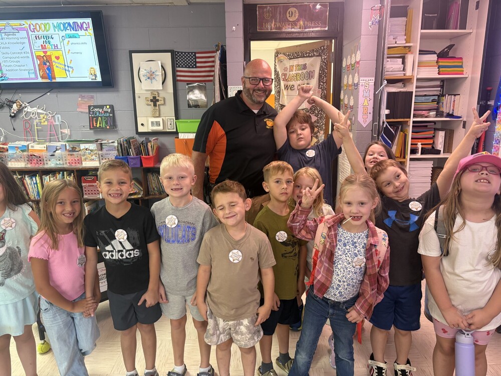 Mrs. Choate's 1st Class were representing yesterday. The entire class had on Officer Christ badges.
