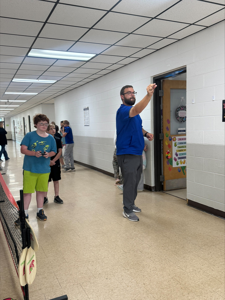 Students launching paper RC airplanes