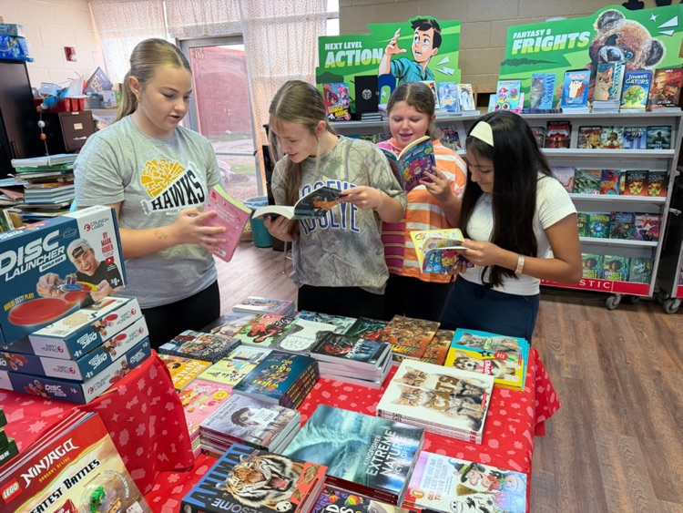 students shopping at the book fair
