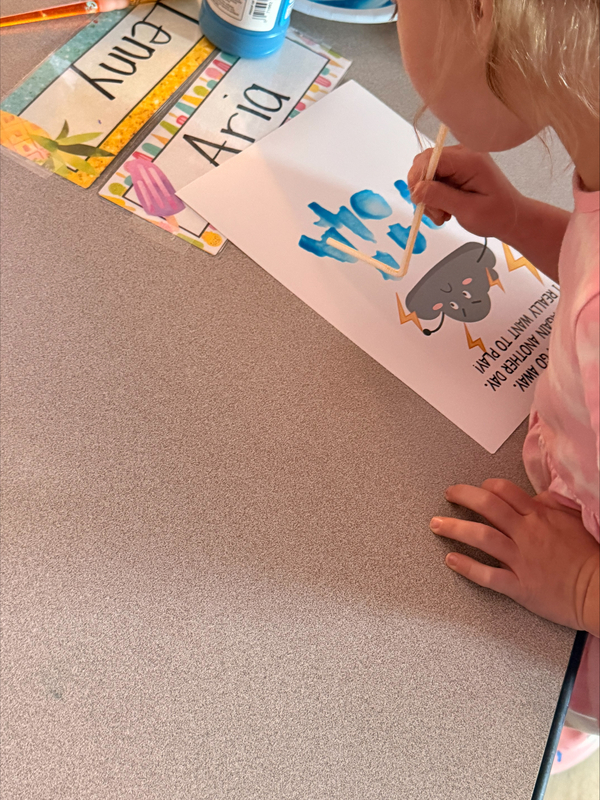 students painting