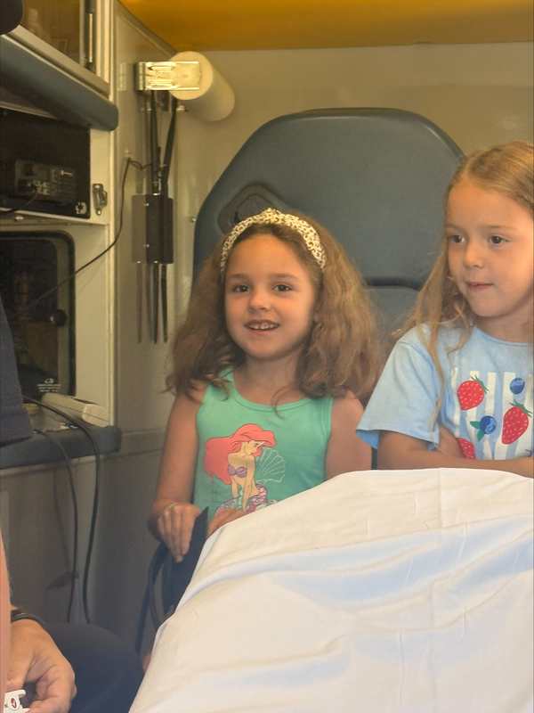 Students visit with EMS