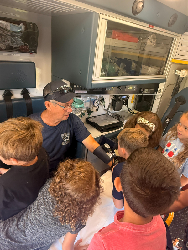 Students visit with EMS