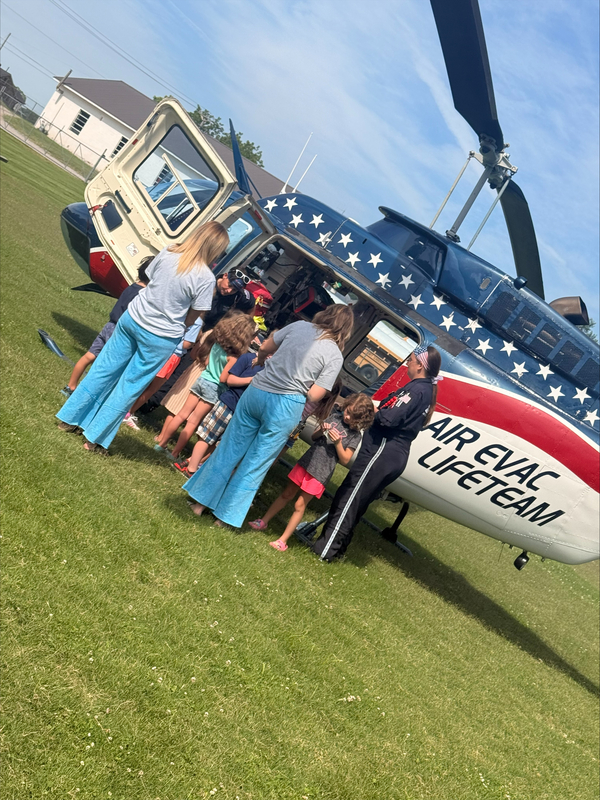 Students visit with EMS