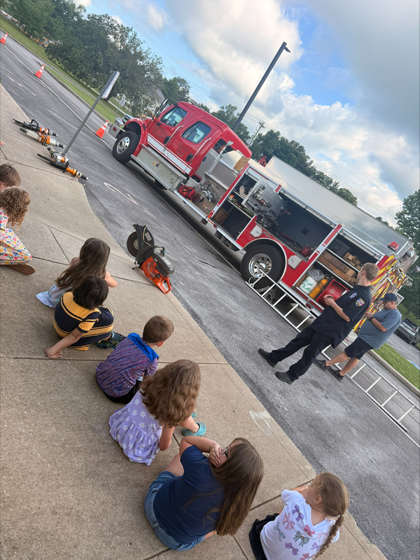 Students visit with EMS