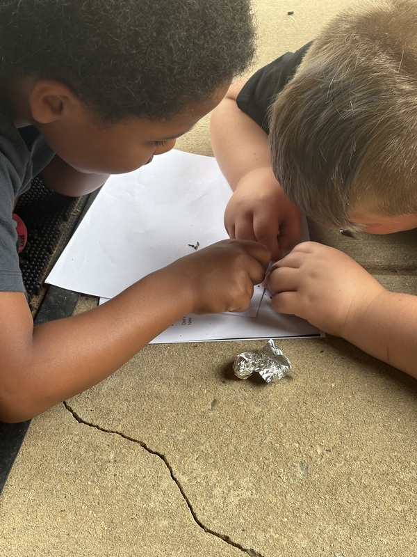 student exploring science activity