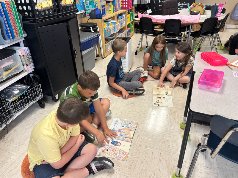 2nd graders reading books from the imagination library