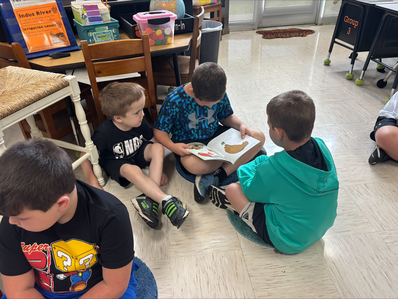 2nd graders reading books from the imagination library