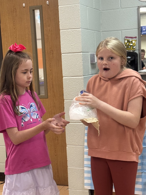 Students experimenting with physical change in science class 