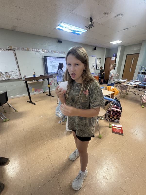 Students experimenting with physical change in science class 