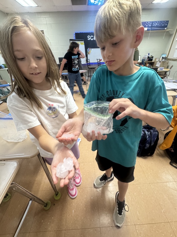 Students experimenting with physical change in science class 