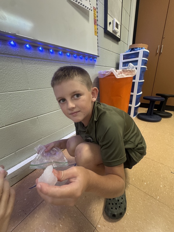 Students experimenting with physical change in science class 