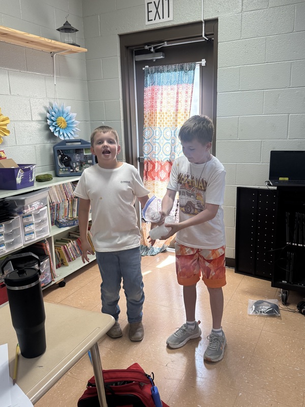 Students experimenting with physical change in science class 
