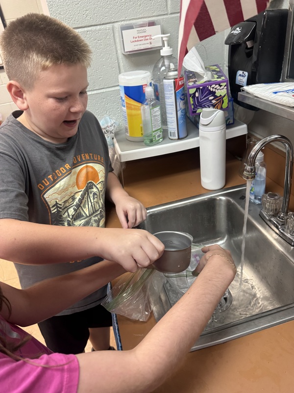 Students experimenting with physical change in science class 