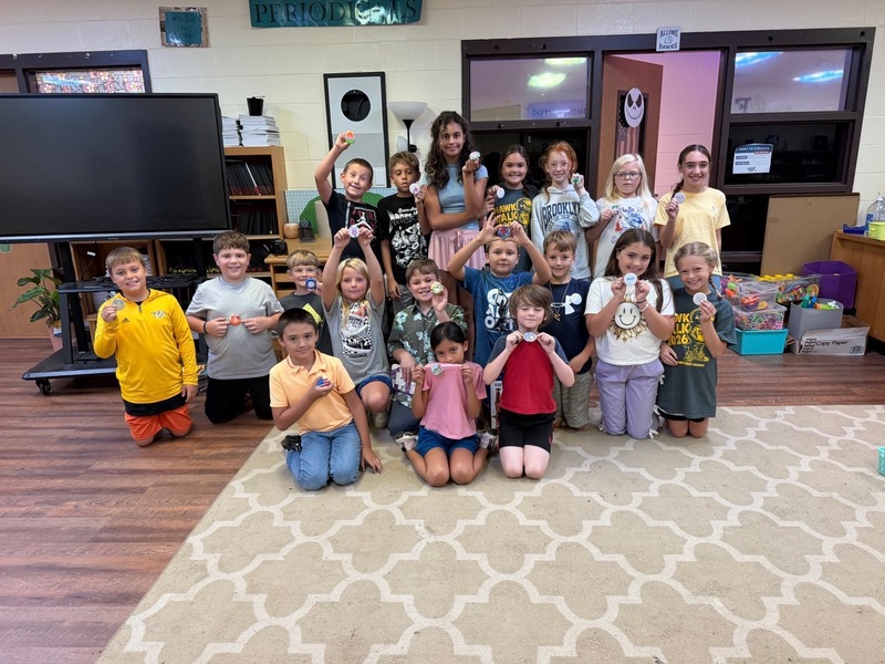 4th grade with their buttons they created in library