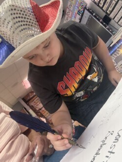 1st Grade signing their classroom constituioln