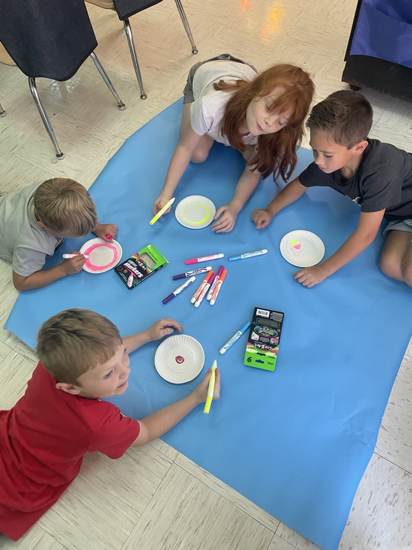Mrs. Gray’s students making dot art