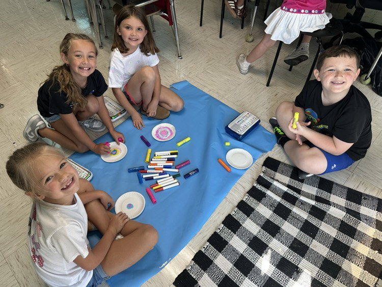 Miss Delk’s students making dot art