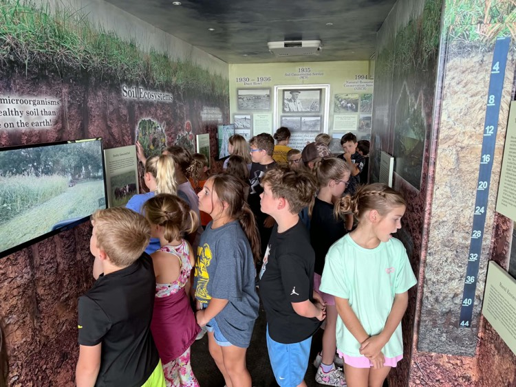 3rd grade students rotate through 13 stations at Farm Bureau’s Ag Day