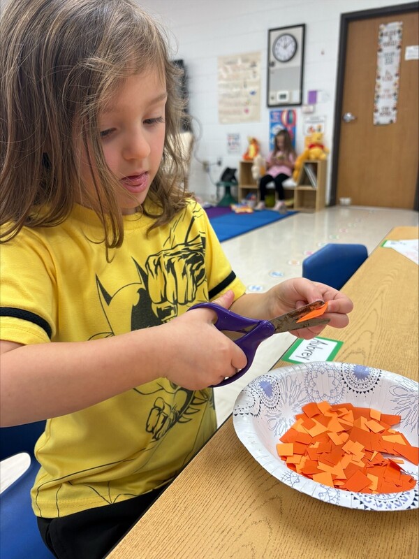 Pre-K practicing their cutting skills