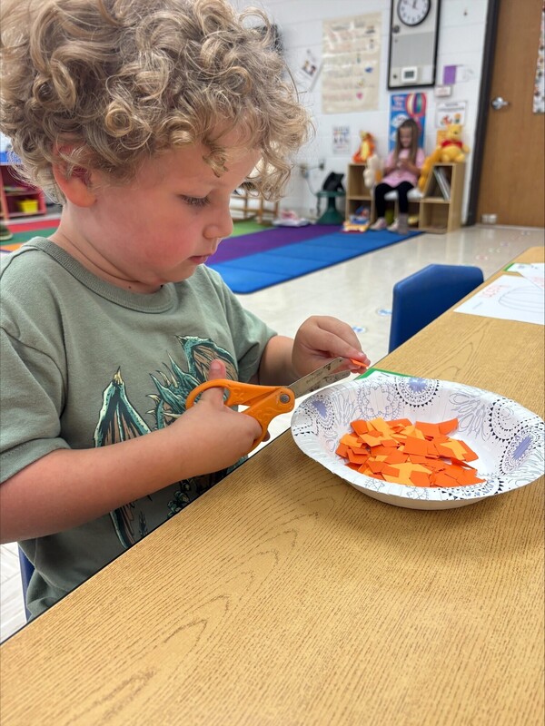 Pre-K practicing their cutting skills