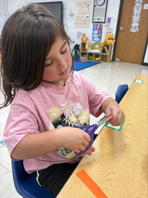 Pre-K practicing their cutting skills