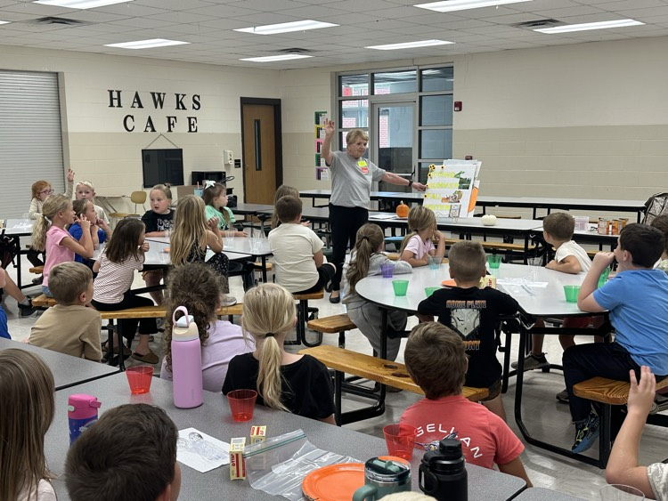 Mrs. Linda Clouse shares pumpkin story with first grade