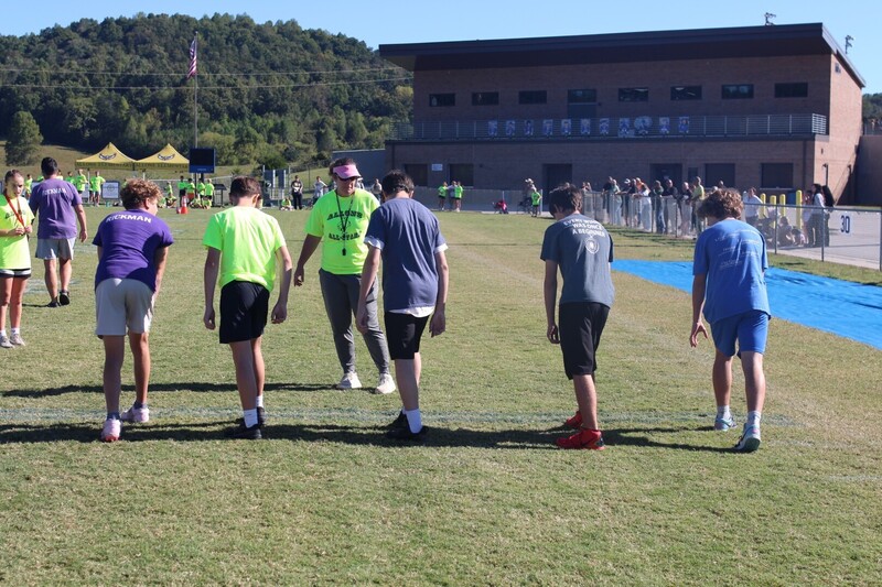 students playing  games at track and field day