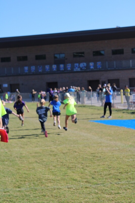 students playing  games at track and field day
