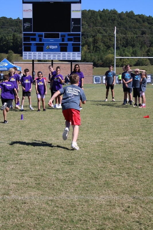 students playing  games at track and field day