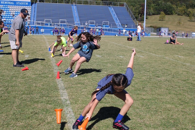 students playing  games at track and field day