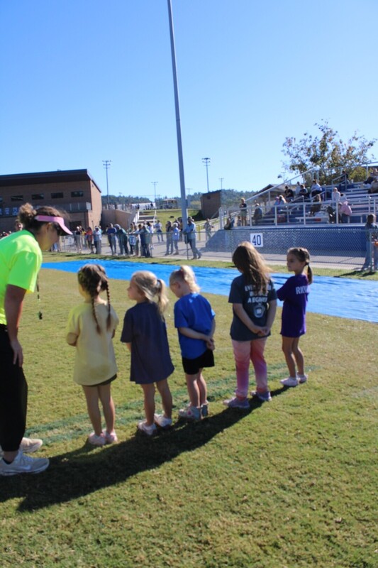 students playing  games at track and field day