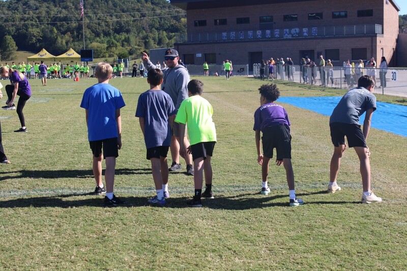 students playing  games at track and field day