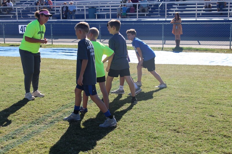 students playing  games at track and field day