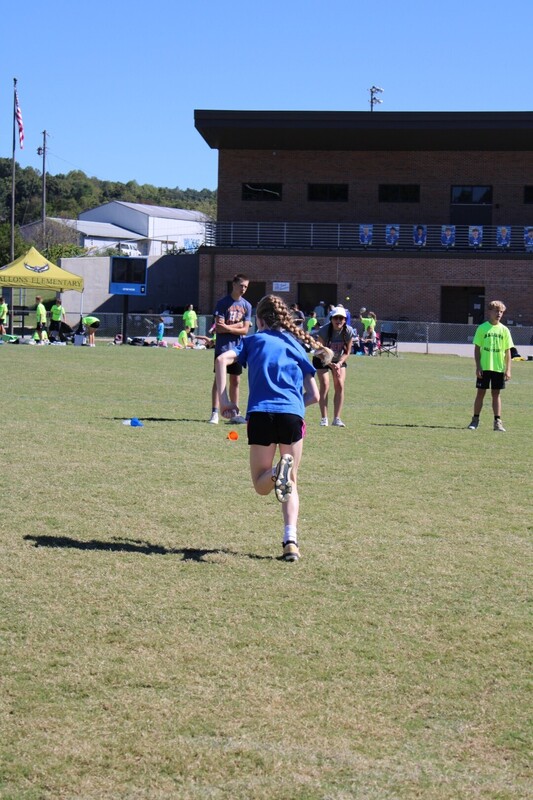 students playing  games at track and field day