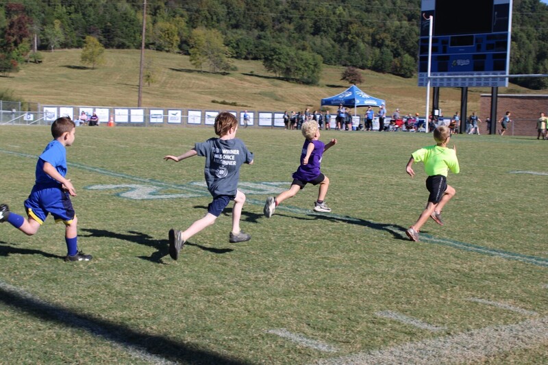 students playing  games at track and field day