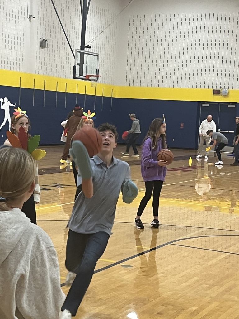 Shooting basketball with oven mitts on